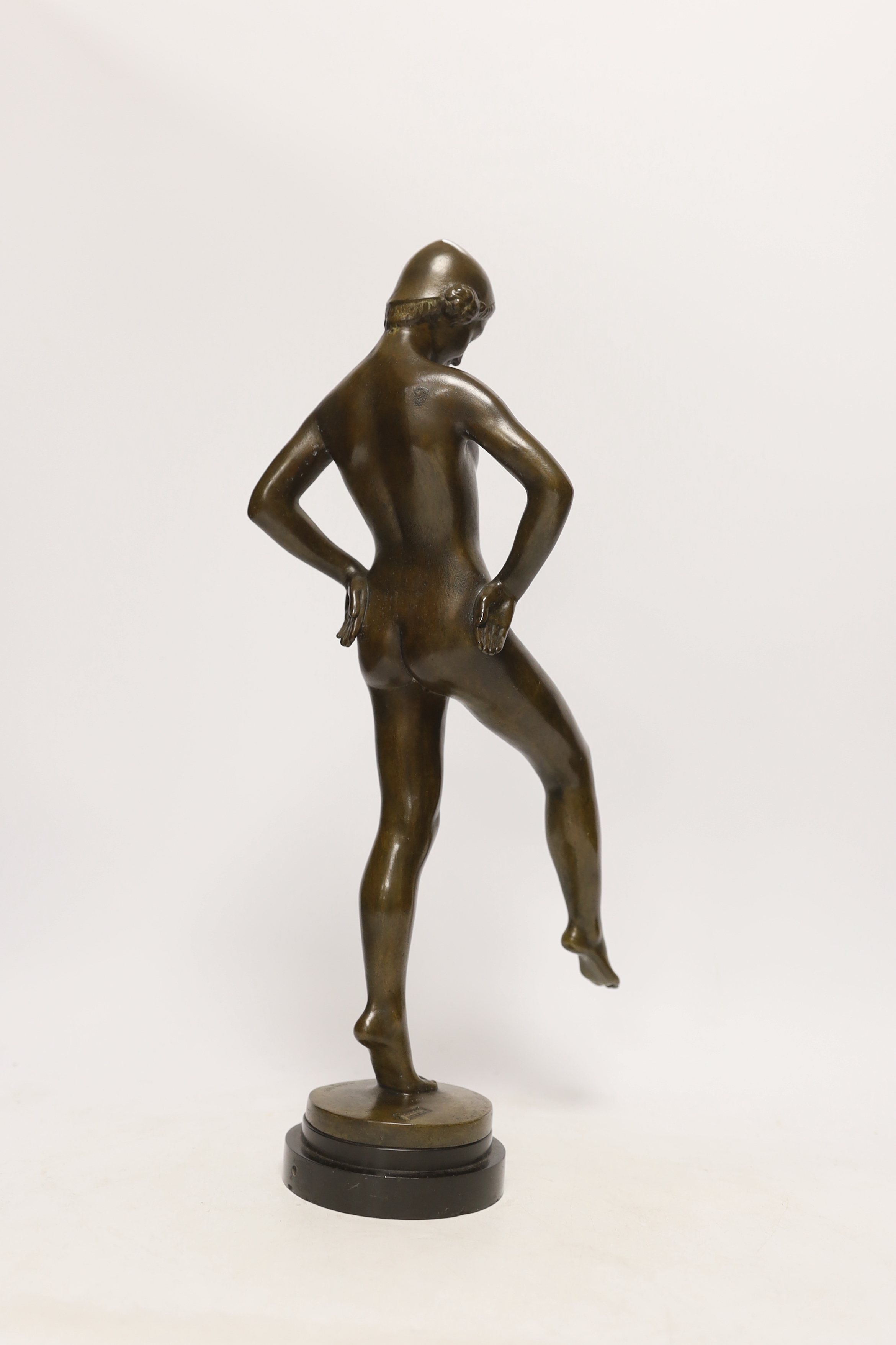 After Daniel-Joseph Bacqué (1874-1947), a bronze figure of an Art Deco woman, raised on circular slate base, 42cm high